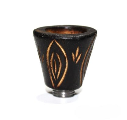 Holzköpfe mit Schnitzerein